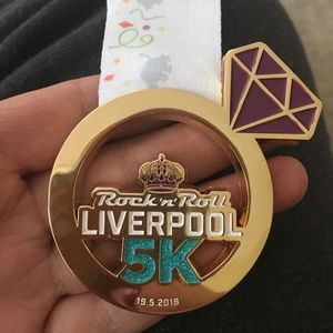Rock N Roll Series: Liverpool 5K finisher medal.